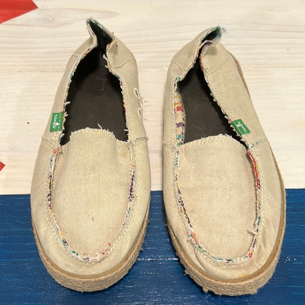 Sanuk tan shoes.